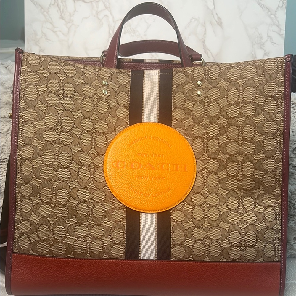 Coach Brown and Orange Leather Briefcase with Monogram Pattern. Sold!!!!